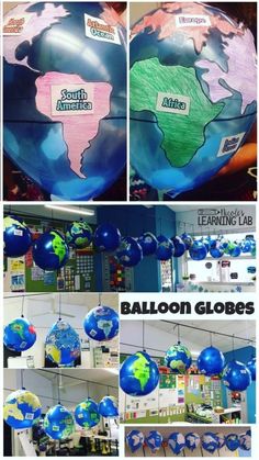 balloon globes are hanging from the ceiling and on display in front of other balloons