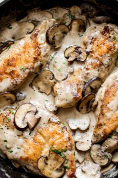 chicken with mushrooms and gravy in a skillet