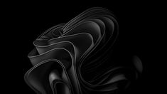 an abstract black background with wavy shapes