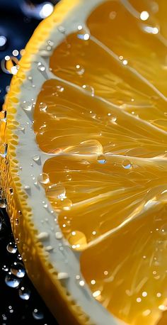 an orange slice with water droplets on it