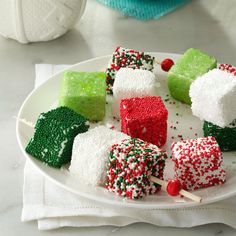 marshmallows and christmas candies on a plate