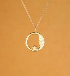 Moon necklace - sun moon and star - moon and star necklace - a gold vermeil moon and star hoop hanging on a 14k gold vermeil chain A peaceful and pretty gold vermeil moon and star charm hanging happily from a 16 inch 14k gold vermeil chain. Please feel free to select a different length chain if you prefer! The moon measures: 16mm across. More from BubuRuby? https://www.etsy.com/shop/BubuRuby?ref=hdr_shop_menu Want to see more gems? http://www.etsy.com/shop/BubuRuby?section_id=12672242 More Druzi Everyday Celestial Moon Charm Necklace, Celestial Crescent 14k Gold Necklace, 14k Gold Celestial Moon Charm Necklace, 14k Gold Celestial Moon Phase Necklace, 14k Gold Crescent Celestial Necklace, Celestial Yellow Gold Charm Necklaces With Moon Phase, Celestial Yellow Gold Charm Necklaces With Star Charm, Celestial Jewelry With Star Charm Round Pendant, Celestial Yellow Gold Charm Necklace With Star Charm