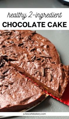 a chocolate cake on a plate with the words healthy 2 ingredient chocolate cake above it