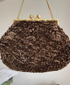 "This is a very nice bag - the woven fur like materials gives it a nice, unique look and softness.  The frame is gold metal and the clasp is two large faux pearls.  The lining is brown silk and it has chain.   This bag is in great vintage condition and is great for a fancy evening event.  Measurements Width - 9: Hight 6 3/4 Drop 6\" My store strives for excellence, honesty and transparency.  Please ask questions and/or request additional photos, if needed, before making a purchase.     Please note: *Every item in my store is vintage used, unless stated in the description otherwise.     *My store does not accept returns.   *My store does not issue refunds, unless an item has not been described accurately.  *My store will only cancel an order within 48 hours of purchase.  *My store does not Pearl Clasp, Fur Stole, Coin Purse Wallet, Evening Purse, Brown Silk, Brown Vintage, Red Silk, Woven Bag, Red Fabric