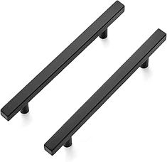 two black cabinet handles on a white background