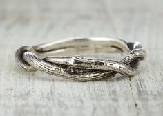 For John - This truly unique silver mens ring is molded from two branches (cast from actual twigs) that twist and wrap around each other The ring has light oxidation to accentuate the natural details and is available in solid sterling silver. Sized to order, this ring is my original design and typically ships in under 1 week. Sizes 4 to 15. Please dont hesitate to contact me with any questions, because I want you to love this ring! Handmade in the USA.  I take a lot of pride in my work and I kno Adjustable Twisted Wedding Rings, Modern Handmade Wedding Jewelry, Handmade Rings With A Modern Twist For Weddings, Rustic Silver Jewelry For Wedding, Rustic Hand Forged Wedding Rings, Rustic Handmade Wedding Jewelry, Union Rings, Faerie Ring, Nature Wedding Ring