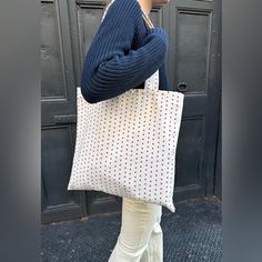 White Tote Bag With A Red Heart Print All Accessories Are Final Sale. Fabrics: 100% Cotton Measurement: 14" (35 Cm) Bag Length, 14" (35 Cm) Strap Length, 14" (35 Cm) Width Made In: China White Rectangular Bag With Heart Print, White Heart Print Bag As A Gift, White Heart Print Bag For Gifts, White Heart-shaped Shoulder Bag For Daily Use, Casual White Heart-shaped Bag, Red Heart-shaped Shopping Bag, White Heart-shaped Everyday Bag, Heart Tote Bag, Tote Outfit