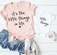 two t - shirts with the words mother of 4 and fighter on them next to some shoes