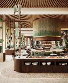 the interior of a restaurant with tables and chairs