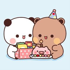 two teddy bears sitting next to each other with a birthday cake in front of them