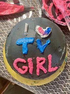 there is a cake that says it's girl on the top