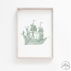 a drawing of a ship in a frame on the wall