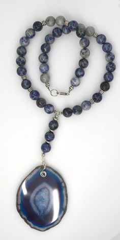 "handcrafted stone necklace jewelry large blue agate slice  approx. 2 3/4 x 2 1/4 inches, the blue Sodalite stones 10 mm, highlighted with silver beads. we design and create each piece individually. This is a fun piece can be dressed up or down. drop with agate is approx. 4 3/4\".  length of necklace is 18\"" Luxury Blue Agate Beaded Necklaces, Blue Agate Beaded Necklaces With Natural Stones, Blue Agate Beaded Necklace With Natural Stones, Agate Slice Jewelry, Jean Art, Agate Slice Necklace, Turquoise Necklaces, Sodalite Necklace, Rock Jewelry