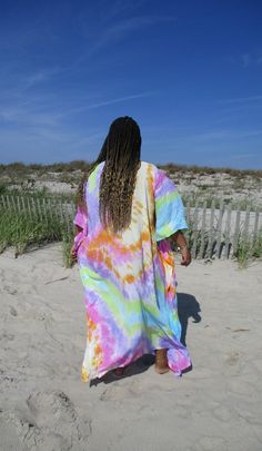 "Maxi Kaftan, Regular or Plus Size, Purple Tie Dye Robe, Boho Maxi Dress, Loose Fitting, Beach Cover-Up, Comfortable Summer Dress, Lounge Wear, Cruise Outfit, Comfy Loungewear Color name: PASTEL RAINBOW aqua-green-wisteria-pink-oj-yellow My gorgeous girlfriend is 36DD-32-44, 5'5\", modeling the regular-size version of this kaftan. This style has NO Sleeves, but depending on your size, it will hang over your arms more or less. This kaftan has a V-neckline, armhole opening on the sides. The fabric Colorful Short Sleeve Maxi Dress For Beach, Multicolor Relaxed Fit Dress For Vacation, Hippie Multicolor Short Sleeve Maxi Dress, Multicolor Short Sleeve Kimono, Multicolor Short Sleeve Beach Dress, Hippie Style Multicolor Short Sleeve Maxi Dress, Oversized Multicolor Beachwear Cover-up, Multicolor Long Maxi Dress For Daywear, Multicolor Short Sleeve Tunic For Beachwear