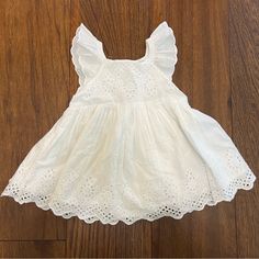 New With Tags, Never Worn! Square Neck, Flutter Sleeves, Eyelet Details. 100% Cotton. Comes With “Underwear” That Can Go Over A Diaper. Perfect For Spring And Summer. Size 12-18m. White Dress With Ruffle Hem And Butterfly Sleeves, Flutter Sleeve Ruffle Dress For Playwear, Flutter Sleeve Dress With Ruffles For Playwear, White Ruffle Hem Dress For Playdate, Gap Spring Dresses With Ruffles, Spring Dresses By Gap With Ruffles, Gap Cotton Dress With Ruffles, White Ruffled Dresses With Butterfly Sleeves, White Butterfly Sleeve Dresses With Ruffles