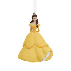 a disney princess ornament hanging from a string