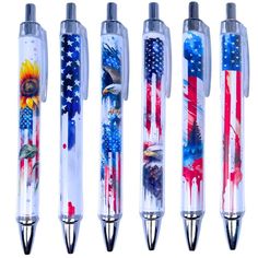 four pens with different designs on them and one pen has an american flag painted on it