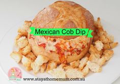 the mexican cob dip is sitting on top of some bread crumbs, and it's ready to be eaten