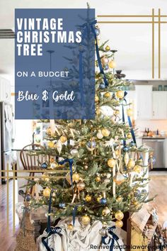 a blue and gold christmas tree with the words vintage christmas tree on it's top