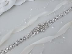 "Thin Bridal Belt, Wedding Belt, Bridal Belt, Rhinestone Belt Sash, Wedding Dress Belt, Crystal Bridal Belt, Wedding Sash Made with love in our studio in California <3 This gorgeous wedding belt will be an amazing complement  for your dress! The ribbon is double side faced silky satin or organza ribbon of high textile quality. It is pleasant to eye and soft to touch. The color is wholesome and saturated. The jewel part includes rhinestones, crystals, pearls of different sizes. The combination of Wedding Dress Belt Crystal, Belt Ribbon, Belt Rhinestone, Sash Wedding Dress, Wedding Belt, Wedding Dress Belt, Wedding Sash Belt, Jewel Colors, Beautiful Belts