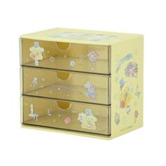 three drawers with winnie the pooh stickers on them, one is yellow and the other is pink