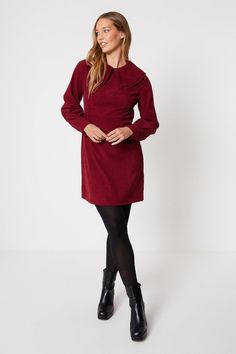 Collared neckline with pretty ruffled detail   Bishop sleeves with matching ruffled cuffs   Panelled corduroy fabric in a rich wine hue   Versatile straight shift silhouette skims the figure   Knee-length cut suits both casual and smart occasions  This wine-coloured corduroy shift dress from Oasis is a versatile wardrobe addition. Cut in a flattering straight silhouette to skim the figure, it features a collared neckline with a pretty ruffled detail that adds feminine flair. The long bishop sleeves are trimmed with matching ruffles at the cuffs for a girly finish. Panelled construction and medium-weight corduroy fabric lend visual interest and movement. Pair this dress with loafers or brogues for a smart daytime look. For evenings out, match it with heeled ankle boots and a leather jack Dress With Loafers, Christmas Party Shoes, Tanned Makeup, Party Handbags, Oasis Dress, Velvet Clothes, Sequin Outfit, Christmas Party Outfits, Short Summer Dresses