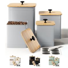 an assortment of kitchen canisters with wooden lids