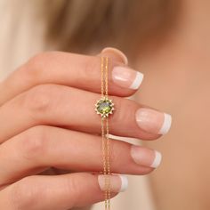 With its shimmering pale green color, peridot stone is also known as the "evening emerald". It is a gemstone often associated with spirituality and expression. Our 14K Solid Gold Peridot bracelet surrounded by Real Diamonds is a stylish jewelery for you and your loved ones with its elegant design. It's time to pamper yourself and your loved ones... Peridot is the birthstone of August. 🤍🤍 Special gifts for your special moments. We produce our jewelery for you in the most perfect way. 🤍🤍 All o Peridot Bracelet, Peridot Earrings, Peridot Necklace, Peridot Stone, August Birthstone, August Birth Stone, Pale Green, Real Diamonds, Special Moments