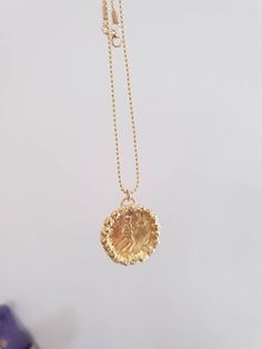 Gold coin necklace, gold pendant necklace, 14k gold necklace, antique coin necklace, medallion necklace, long coin necklace Long 14k gold filled necklace with an antique gold coin pendant, decorated with golden hammered beads. Beautiful minimalist round pendant, designed in an antique style, this gold coin medallion necklace is just a great gift for her It will be your to go necklace, for day or night, never needing to to take it off. Dimensions: The coin medallion pendant diameter is about 0.75 Brass Medallion Necklace Tarnish Resistant, Tarnish Resistant Brass Medallion Necklace, Yellow Gold Brass Medallion Charm Necklace, Engraved Gold Plated Medallion Necklace, Gold Plated Medallion Necklace, Gold Plated Yellow Gold Medallion Necklace, Brass Medallion Charm Necklaces, Tarnish Resistant Gold Plated Medallion Necklace, Gold Plated Medallion Locket Necklace