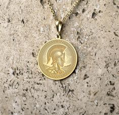 You can purchase this unique Spartan warrior necklace in gold silver and gold plated options. - Material Options: 14K Solid Gold, 925 Sterling Silver, Silver Gold Plated - Silver Thickness 1 mm  - Solid Gold Pendant Thickness 0.8 mm Sizes Available: - 18mm / 0.70 inches - 20mm / 0,78 inches - 25mm / 0,98 inches - 30mm / 1,18 inches - 35mm / 1,37 inches - 40mm / 1,57 inches - 50mm / 1,96 inches -We can engrave the back of your pendant with your custom personalized message, text, name or date for Warrior Style Gold Necklaces As Gift, Message Text, Warrior Necklace, Spartan Warrior, Gold Plated Silver, Gold Pendant, Charm Pendant, Solid Gold, Silver Gold