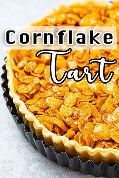 a close up of a pie with the words cornflake tart