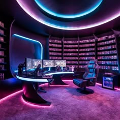 a room with several computers and chairs in it, all lit up by neon lights