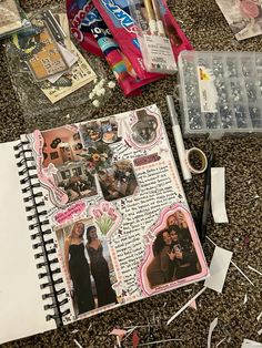 the contents of a scrapbook are spread out on the floor