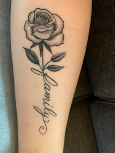 Tattoo Rose With Script Stem Tattoo, Rose Tattoos With Names Stem, Rose With Family Tattoo, Rose Words Tattoo, Family Rose Tattoo Design, Rose Into Name Tattoo, Rose With Name Tattoo Design, Rose With Names Tattoo, Rose Name Stem Tattoo