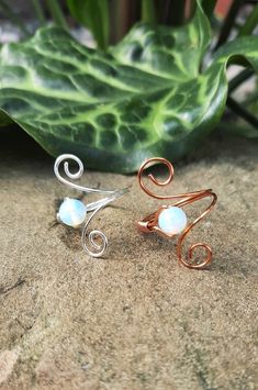 "This beautiful wire wrapped ring is made of tarnish resistant copper wire and a 6mm Opalite stone. This unique adjustable design makes it so you can change which finger you wear it on and makes on and off a breeze. I do ask for a ring size so that it is the best fit for you. If a different size is needed, please let me know in the \"note to seller\" box at checkout.  CARE: These rings can bend easily, so it is best to take off before sleeping. NOTE: Each ring is handmade to order and may not lo Hemp Bracelets, Wire Wrapped Ring, Wire Wrapped Rings, Ring Unique, Wrap Rings, Matching Bracelets, Hippie Chic, Adjustable Bracelet, Copper Wire