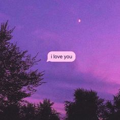 a purple sky with the words i love you written on it and trees in the foreground