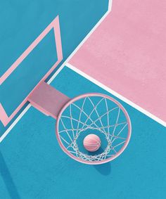 an overhead view of a basketball hoop with a ball in the net on a blue and pink court