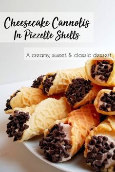 cheesecake candies with chocolate chips in them on a white plate and text overlay reads cheesecake canapes in pizze shells