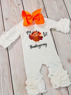 This adorable Turkey romper is perfect for your cute little ones first Thanksgiving.  This romper is made from a soft cotton stretch fabric.  The Turkey and writing is done in vinyl and cut and handmade from home.  I cut my own vinyl and heat press it right from my Etsy shop.  My rompers are made carefully with love.  You can add a personalized name or My First Thanksgiving. You can choose these options at check out.  Size chart is  Preemie 5-7lbs Newborn Holiday Romper, My First Thanksgiving, Thanksgiving Baby Outfits, Girls Thanksgiving, Cute Black Babies, Thanksgiving Baby, First Thanksgiving, Newborn Outfit