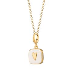 Embrace the enduring beauty of this 18ct gold plated locket necklace. Crafted with high-quality materials, it features a classic heart shape highlighted by crisp white enamel. This piece is more than just an ornament; it's a cherished keeper of your most treasured memories. Open the locket to hold tiny photographs close to your heart, adding a touch of sentimental value to your everyday style.  All our charms attach with a clip-on clasp and are compatible with all other leading charm jewellery brands. Simply clip-on or slide-on to a chain, charm bracelet or charm carrier necklace.  All Lily Charmed jewellery comes presented in a beautiful gift box hand tied with ribbon. Material: 18ct Gold Plated Recycled Sterling Silver with White Enamel.  At Lily Charmed, we strive to provide our custome Heart Locket Necklace, Locket Charms, Box Hand, Heart Locket, White Heart, Recycled Sterling Silver, Watch Necklace, Locket Necklace, Beautiful Gift Boxes