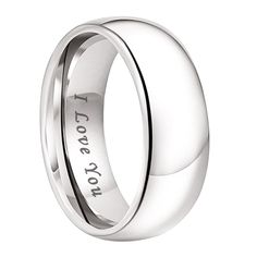 a wedding ring with the words i love you engraved on it, in white gold