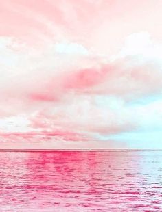 a pink and white photo with a sign on it that says cave paradise in front of the ocean