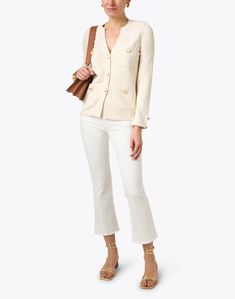 St. John is known for their commitment to classic American luxury, and this ecru jacket does not disappoint. This luxurious knit features gold buttons, patch pockets, and a ribbed trim for a chic finish. Wear it over sleek separates or on its own for a polished look. Armani White, Skirt And Top Dress, White Denim Jacket, Boucle Jacket, Classic American, Cotton Jacket, Knit Jacket, Gold Buttons, White Denim