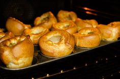 several baked goods are sitting in the oven