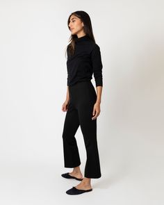 Minimal, clean, and quietly chic: our Faye shape is a refined pant without all the fuss. It just pulls on, with an elastic waist that doesn't scream “elastic waist” and a kick flare that's cropped to an above-the-ankle length. This particular pair is our go-to, made of a lush, stretchy ponte knit that holds you in a bit and feels really good against the skin. Add a sweater and a scarf for an instant plane (or anywhere else) outfit. Denim Sweater Jacket, Denim Sweater, Clothing Catalog, Kick Flares, Knit Pants, Denim Pant, Pants Outfit, Honduras, Sweater Weather