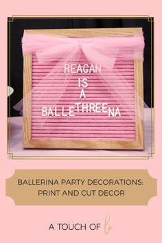 a pink party decoration with the words reagan is a ball - ethrena on it