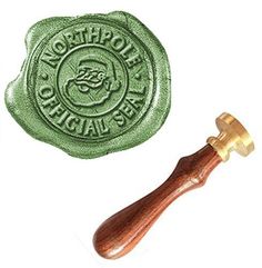 a green wax seal with a wooden handle and an inscription on it that says northport general seal