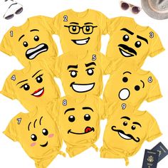 a group of yellow shirts with faces drawn on them