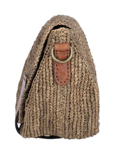 a straw bag with a leather handle on the front and side, sitting against a white background