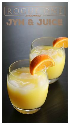 two glasses filled with orange juice and garnished with an orange slice on the rim